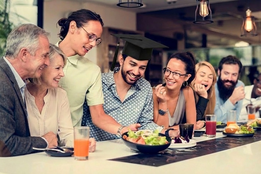 Celebrating Graduation at Restaurant with Friends and Family Thumbnail